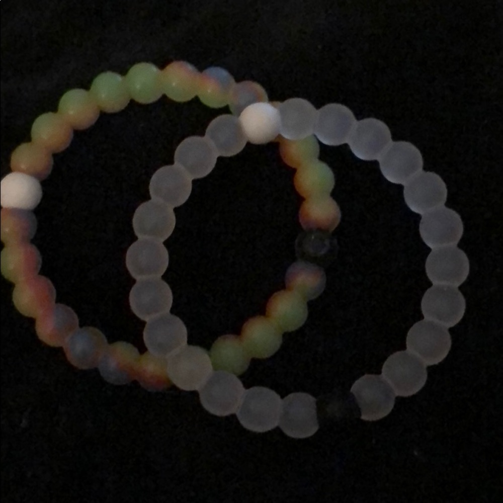 Lokai bracelets both